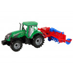 Zelený traktor s červeným pluhom