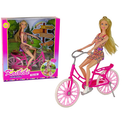 Bábika na bicykli